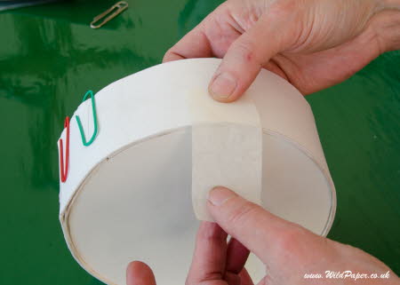 8.Attach rim to base with masking tape